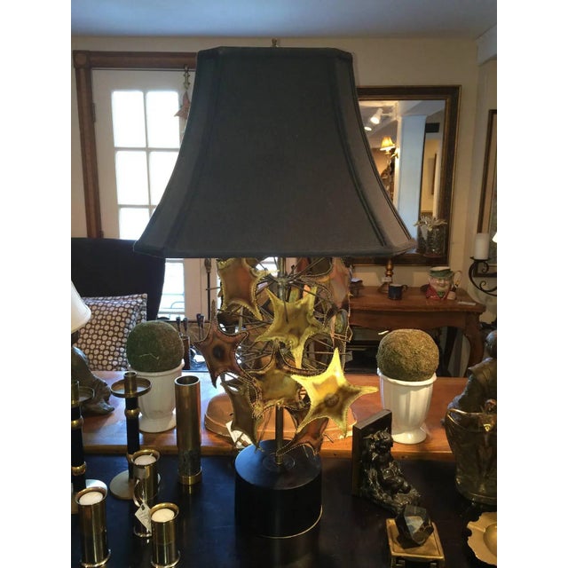 Brutalist Mid-Century lamp in the style of Curtis Jere. Torch cut shapes of stars and branches or starfish . Supported by...