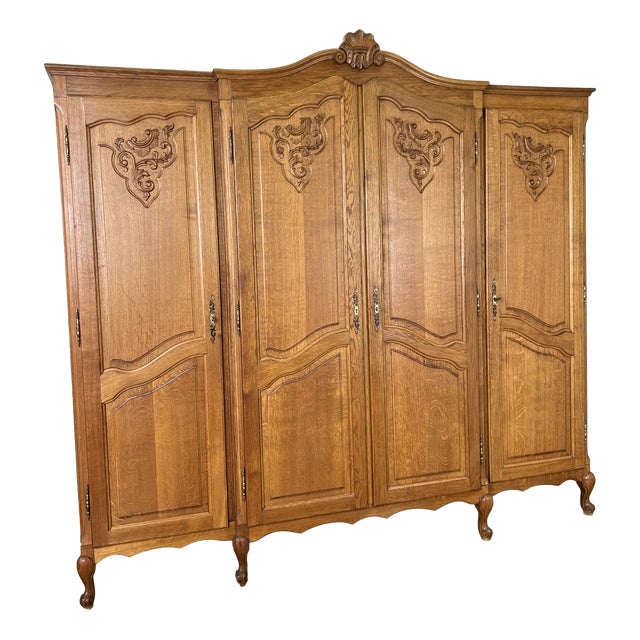 Vintage Louis XVI French Oak Four Door Carved Armoire For Sale