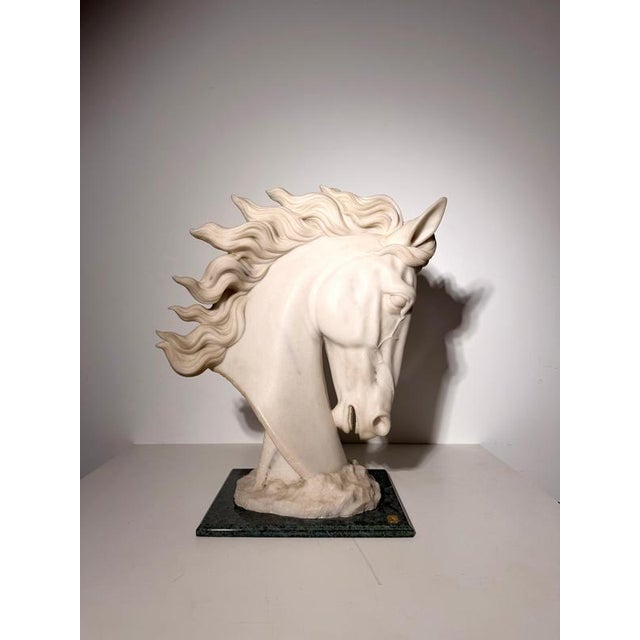 Elegant decorative sculpture depicting a stylised horse’s head , finely modelled with flowing mane and expressive facial...