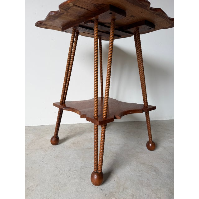 1900 - 1909 Antique Arts & Crafts Style Two-Tier Oak Accent Table With Scalloped Top Barley Twist Legs and Ball Feet For Sale - Image 5 of 12