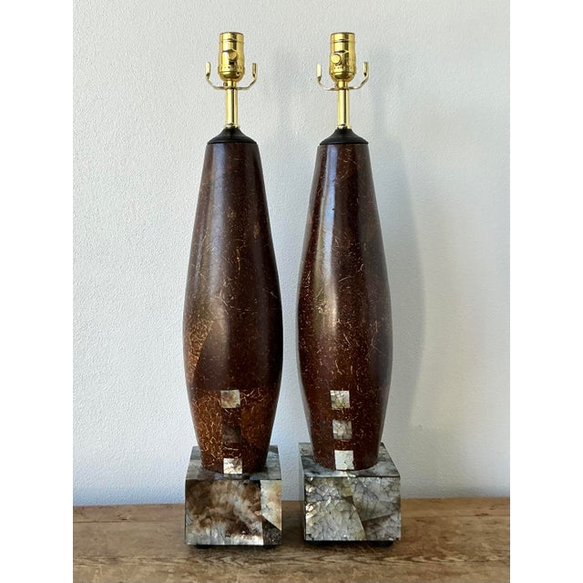 This exceptional pair of vintage table lamps is a masterful distillation of 1970s Organic Modernism. Each lamp features an...