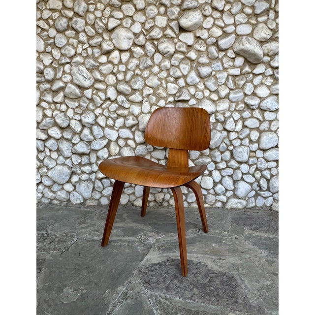 Original DCW (Dining Chair Wood) designed by Charles & Ray Eames and manufactured by Herman Miller in the United States...
