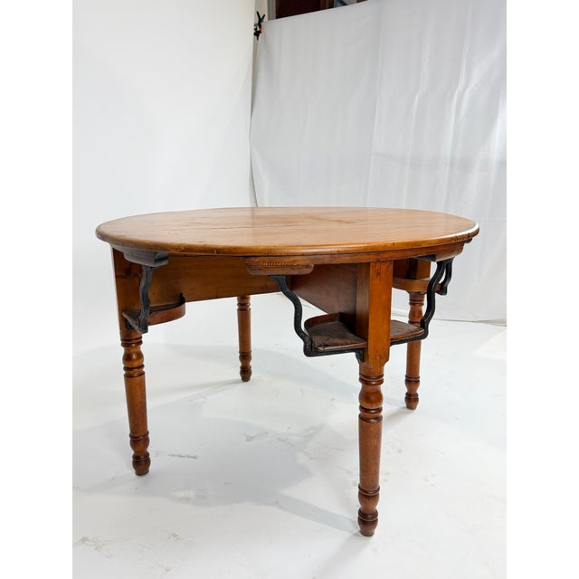 This is a beautiful 19th century Sheraton style game table crafted in warm country pine. The piece carries an inviting...