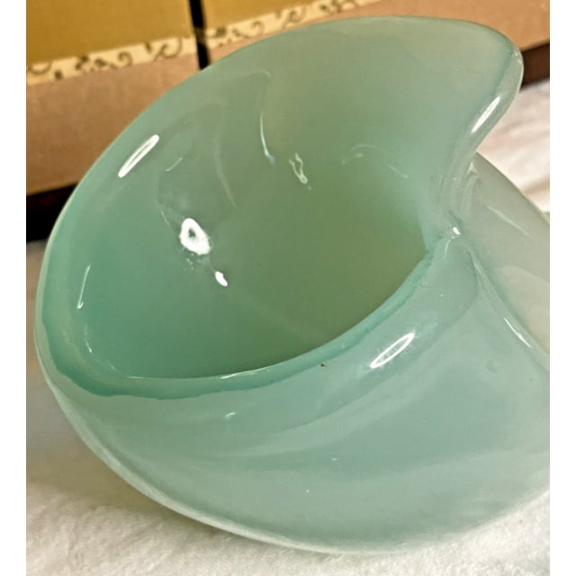 Up for sale is a stunning, authentic mid-century modern hand-blown Murano art glass shell bowl, attributed to the...