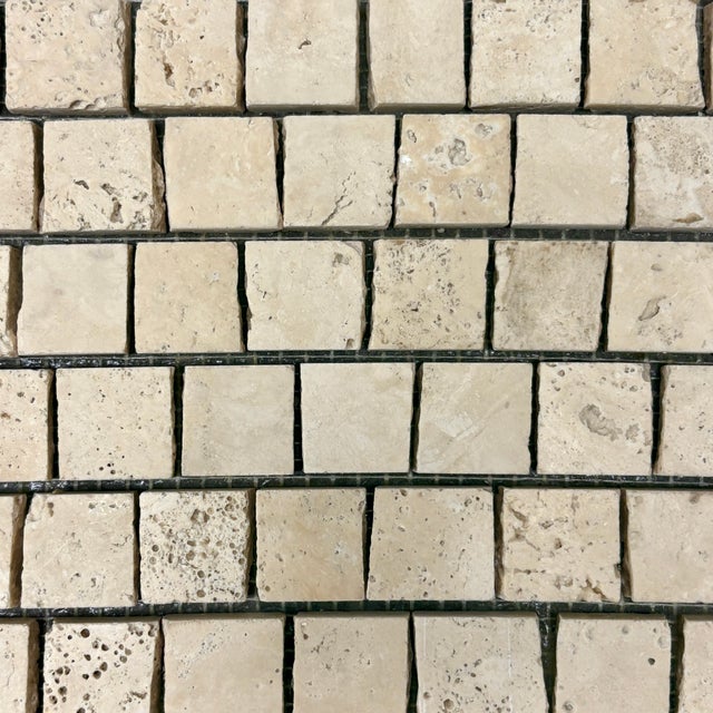 Honed and unfilled angers travertine broken tessere decorative mosaic tile. Suitable for use in vertical and horizontal...