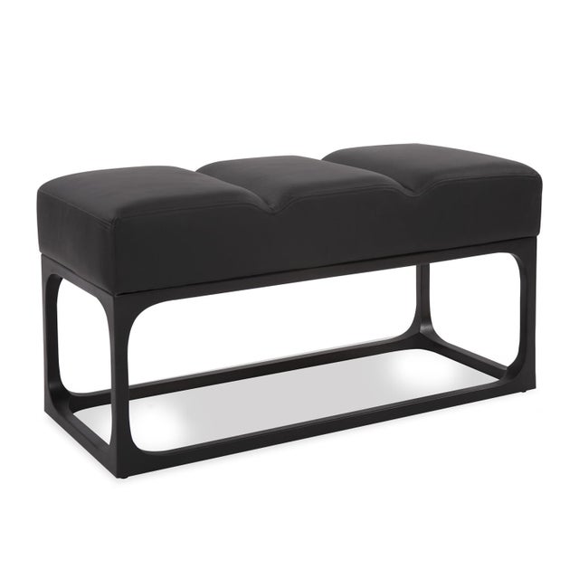 The Roma Leather Bench features an iron frame with beautifully curved corners in a matte bronze finish and black channeled...