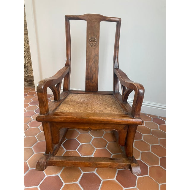 Vintage Chinese Ming-style lounging rocking chair, often referred to as a "moon-gazing" or "star-gazing" rocker. This...