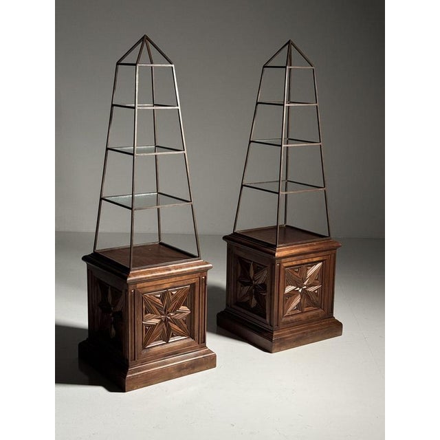 Set of two obelisk-shaped etageres / cabinets. Presumably from France, mid-20th century. The open, tapering upper...
