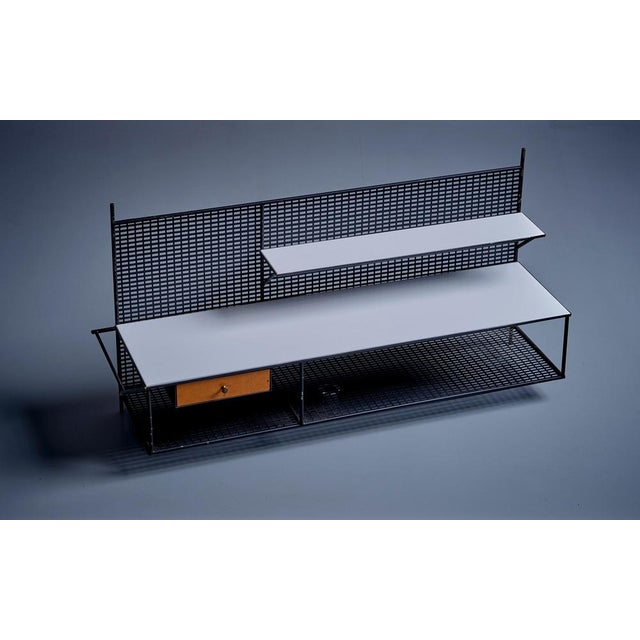 Paul McCobb for Bryce Wall Shelf in Wood and Metal, USA - 1950s. Wall-mounted floating console with wooden drawer and...
