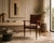 This elegant Italian Mid-Century desk armchair, designed by Vittorio Dassi and produced during the 1950s, reflects the...