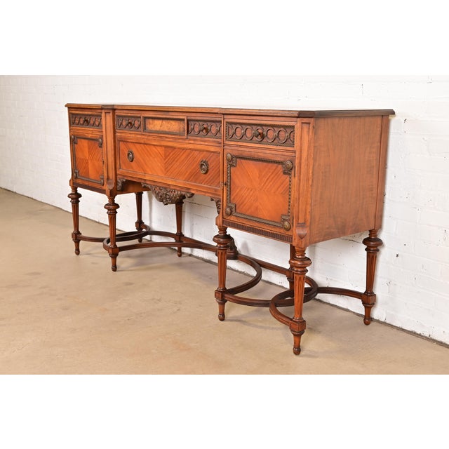 An exceptional antique French Regency Louis XVI style sideboard, credenza, or bar cabinet By Johnson-Handley-Johnson Co....