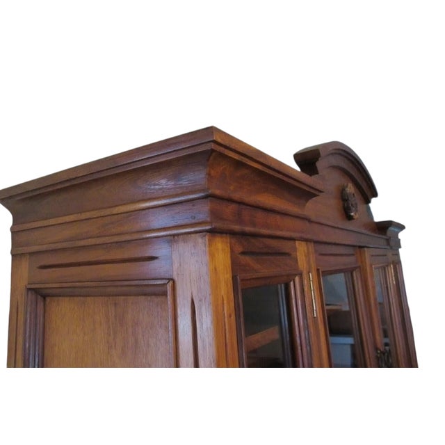 Great shape tight and sturdy. minor wear and scratches. one top door is slightly warp. Cabinet was custom made in 1980....