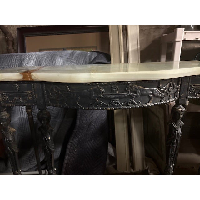 Vintage Italian solid brass console table with a solid onyx top. The top is removable. See all the photos for the details....