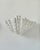 Pair of wall sconces attributed to serge roche, composed of a thick plaster structure, produced in france in the 1940s....