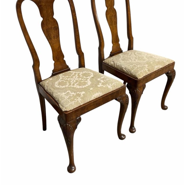 Pair of Queen Anne Style Burl Walnut Side Chairs with Shell Carved Cabriole Legs Measurements: 38"H x 19.5"W × 23"D