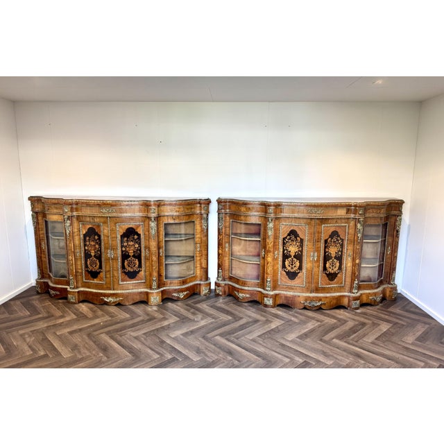 Exceptional quality pair of antique Victorian walnut marquetry inlaid credenzas, having an outstanding quality pair of...