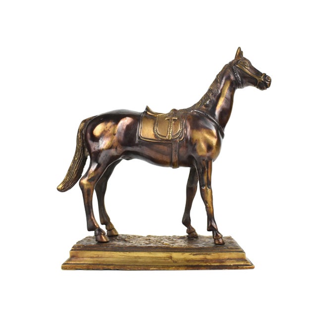 Stunning bronze horse figurine on base. It is unique piece with beautiful details to enhance any home or office decor....