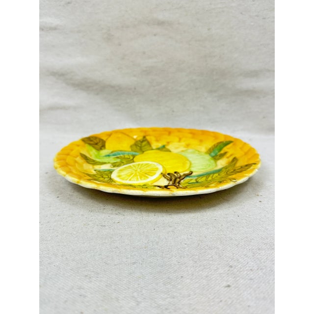 Vintage ceramic plate decorated with leaves and lemons. This is a pre-owned item so please see all pictures and ask any...