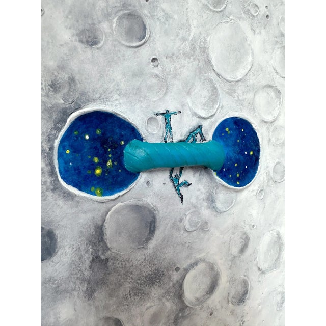 The same is a mixed media wall sculpture by vera vizzi that renders the lunar surface as both stage and symbol. Modeled in...