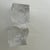 Sculptural pair of vintage crystal candle holders by Orrefors of Sweden. Each features a substantial geometric block form...