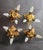 Gold-plated and silver-plated set of four hand-forged three-light banci firenze florentine ceiling lights, wall sconces,...