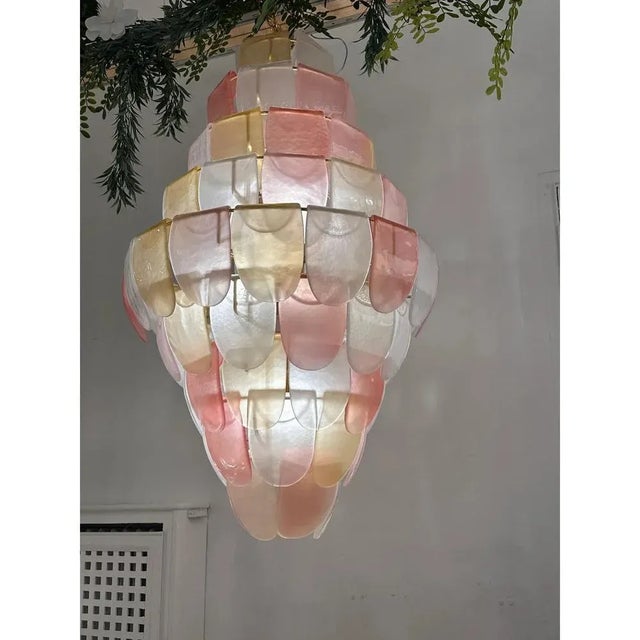 Luxury modern chandelier with sanded pink and amber ”petals” in murano glass style hand-made in murano glass , all made in...