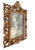 Elaborate and ornate scrolls and floral design, characteristic of the Rococo style, this hand-carved mirror has a unique...