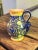 This Vintage Hand Painted Colorful Ceramic Talavera Pitcher is a unique and beautifully crafted piece that adds a touch of...
