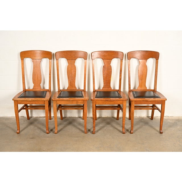 A beautiful set of four antique Mission or Arts & Crafts period side chairs or dining chairs By Heywood Wakefield USA,...