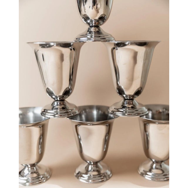 This vintage set of 6 stainless steel cups from 1970s Italy reflects timeless elegance and practical design. with their...