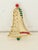 Fun vintage Christmas brooch. Features rhinestones and a holiday bell. Perfect to adorn holiday outfits. This is a pre-...