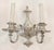 Cast brass two arm sconces with silver plating. These are wired and ready to ship. Priced as a pair. The manufacturer and...