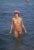 Saint-Tropez Swimmer 1971 by Slim Aarons Slim Aarons Limited Estate Edition A topless swimmer in Saint-Tropez, on the...