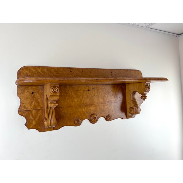 This lovely Victorian wall shelf is crafted from richly figured birdseye maple, a wood prized throughout the 19th century...