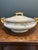 **Story & Design:** Elevate your tablescape or china cabinet with this exquisite antique French porcelain covered serving...