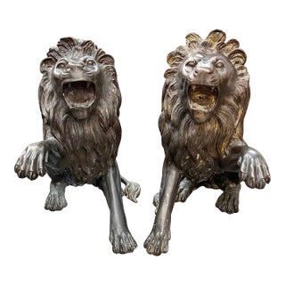 Pair of Patinated Bronze Lions For Sale