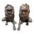 Pair of Patinated Bronze Lions For Sale