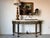 This vintage Maitland-Smith console table is a statement piece that exudes grandeur and old-world craftsmanship. Designed...