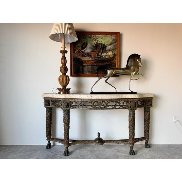 This vintage Maitland-Smith console table is a statement piece that exudes grandeur and old-world craftsmanship. Designed...