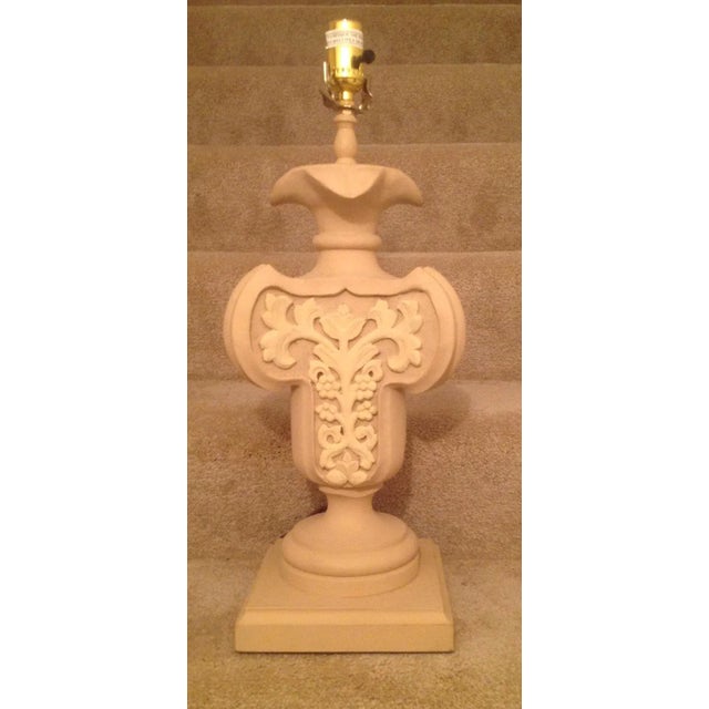 This is a classic lamp with hand carving on three sides. The design is very unique and appealing to both designers and...