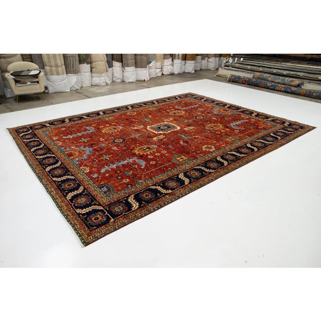 This exquisite room-sized rug presents a contemporary interpretation of the traditional Serapi style, meticulously crafted...