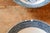 Blue and white transferware bowls that were part of a larger collection of vintage china gathered to be used by artist...
