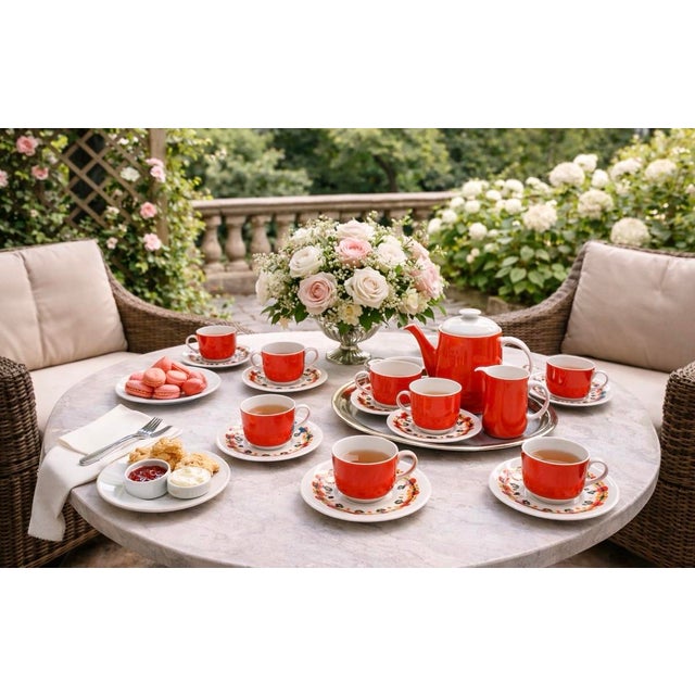 This vintage English Royal Doulton Set features a vibrant orange color with intricate floral design. Perfect for your...