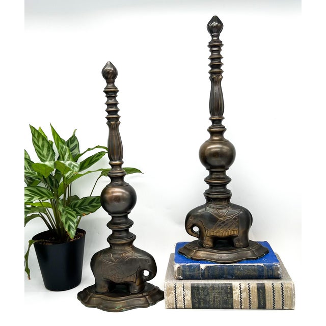 Delightful pair of mid to late 20th century brass mantel ornaments in the form of traditional andirons. Each features a...