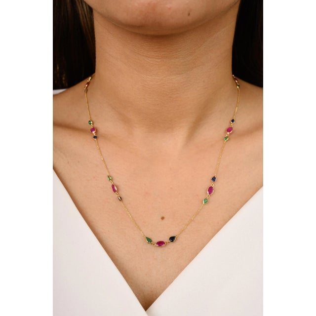 This is part of Chairish’s Fine Jewelry assortment. Handcrafted Emerald Ruby Sapphire Chain Necklace in 18K Gold studded...