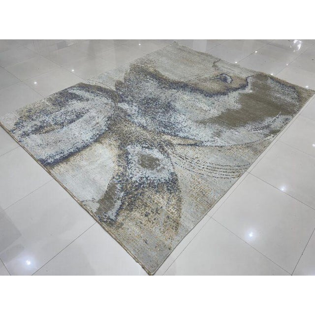 Classic Lydia Silver Hand Knotted Wool Rug. This exceptional piece transcends traditional design, offering a sophisticated...