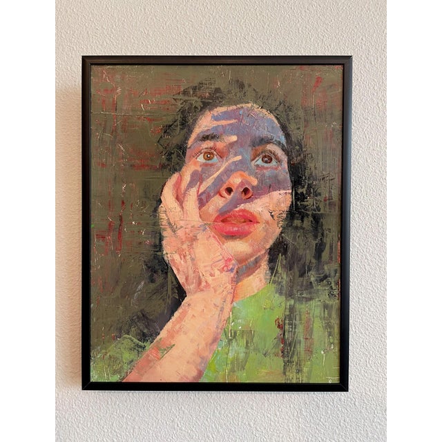 In "Shadow Work," the artist explores the interplay of light and shadow on the human face, creating a contemplative...