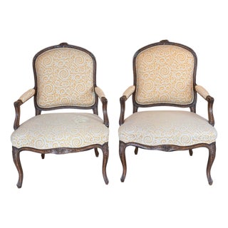 Pair of 19th Century French Armchairs With Carved Floral Crests For Sale