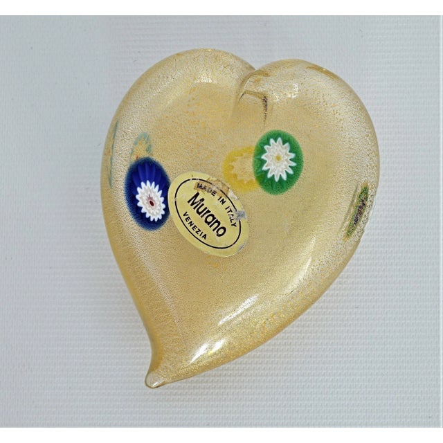 Offering a beautiful vintage hand-blown Murano glass heart with gold aventurine and colored murrines throughout. It is...