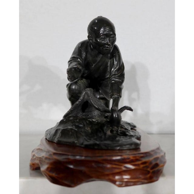 The Peasant Trapping the Bird Under His Hat, 20th-century, Bronze For Sale - Image 11 of 18